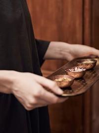 Tibetan & Unani brass tray in hands