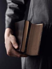 Tibetan & Unani books in hand