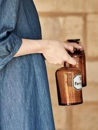 Hydrotherapy jars in hands