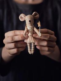 Homeopathy Toy mouse in hands