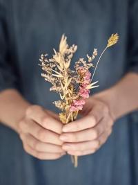 Dried flowers in hand