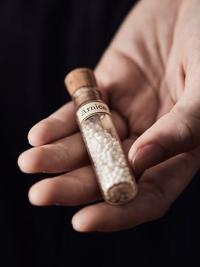 Homeopathy remedy in hand