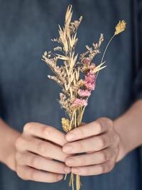 Dried flowers in hand