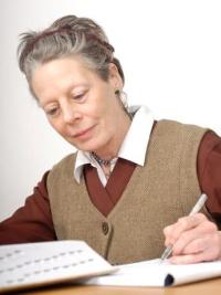 Medical science student Val writing notes