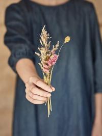 Dried flowers in hand