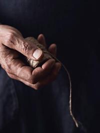 Ball of string in hand