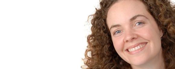 Theresa studying yoga at home