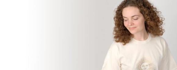 Theresa studying yoga at home