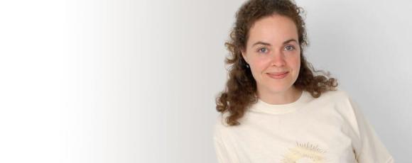 Theresa studying yoga at home